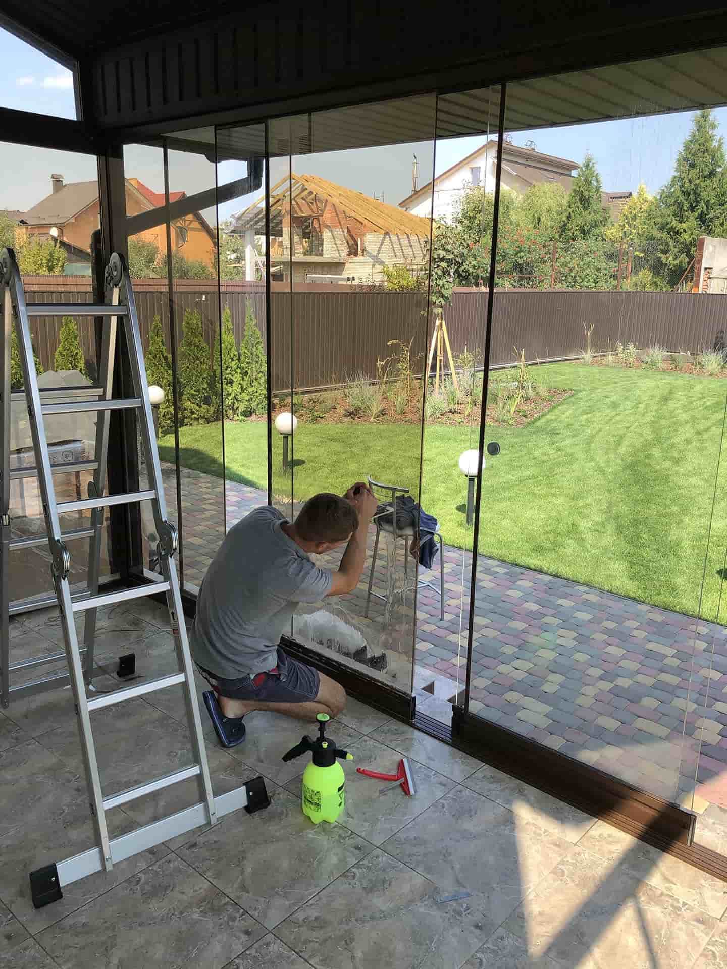 Owner at work on glass
